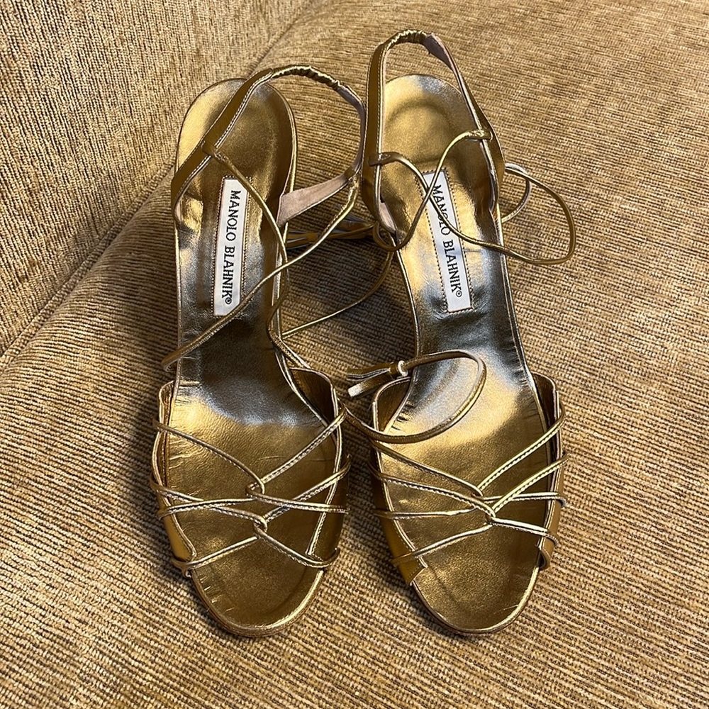 Manolo Blahnik gold heel.